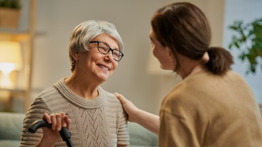 Woman caring for elderly patient